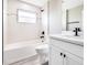 Modern bathroom with tub, toilet and vanity at 16098 Overdale Ct, Punta Gorda, FL 33955