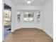 Bright dining area with hardwood floors and access to the backyard at 17088 Doyle Ave, Port Charlotte, FL 33954