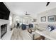 Bright living area with sectional sofa and views of the pool and patio at 1945 Jamaica Way, Punta Gorda, FL 33950