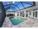 Resort-style pool and spa with covered lanai at 1945 Jamaica Way, Punta Gorda, FL 33950