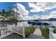 Private boat dock with pathway to the water at 1945 Jamaica Way, Punta Gorda, FL 33950