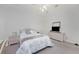 Comfortable bedroom with queen bed, dresser, and ceiling fan at 1945 Jamaica Way, Punta Gorda, FL 33950