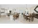 Bright dining area adjacent to kitchen, featuring a wood table and chairs at 1945 Jamaica Way, Punta Gorda, FL 33950