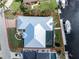 Bird's eye view showcasing home, pool, and canal-front lot at 1945 Jamaica Way, Punta Gorda, FL 33950