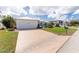 Two-car garage and stamped concrete driveway at 1945 Jamaica Way, Punta Gorda, FL 33950
