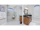 Bathroom boasts double sinks, granite countertops, and a walk-in shower at 1945 Jamaica Way, Punta Gorda, FL 33950