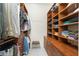 Custom walk-in closet with shelving, drawers, and hanging space at 1945 Jamaica Way, Punta Gorda, FL 33950