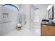 Large bathroom with walk-in shower, granite vanity, and window at 1945 Jamaica Way, Punta Gorda, FL 33950