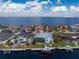Waterfront home with pool and private boat dock, aerial view at 1945 Jamaica Way, Punta Gorda, FL 33950