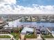 Aerial view of waterfront property showcasing a house and boat slip at 1945 Jamaica Way, Punta Gorda, FL 33950