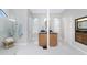 Spacious bathroom with double sinks, granite countertop, and walk-in shower at 1945 Jamaica Way, Punta Gorda, FL 33950