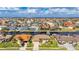 Aerial view of waterfront homes with lush landscaping and boat docks at 2736 Magdalina Dr, Punta Gorda, FL 33950