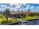 Relaxing backyard oasis with a pool and canal views at 2736 Magdalina Dr, Punta Gorda, FL 33950