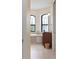 Bathroom featuring a soaking tub and large windows with natural light at 2736 Magdalina Dr, Punta Gorda, FL 33950