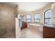 Bathroom featuring a walk-in shower, soaking tub, dual sink vanity and natural light from the large windows at 2736 Magdalina Dr, Punta Gorda, FL 33950