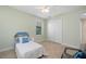 Bedroom featuring tile flooring, a boat-themed headboard, a window with blinds and a closet at 2736 Magdalina Dr, Punta Gorda, FL 33950