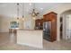 Kitchen featuring granite countertops, stainless appliances, and a breakfast nook in an open layout at 2736 Magdalina Dr, Punta Gorda, FL 33950