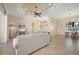 Living room highlighting tile floors, neutral decor, and an open floor plan at 2736 Magdalina Dr, Punta Gorda, FL 33950