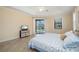 Spacious main bedroom featuring tile floors, a ceiling fan, and sliding glass doors leading to the pool at 2736 Magdalina Dr, Punta Gorda, FL 33950