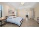 Main bedroom featuring a neutral color scheme, tile floors and an ensuite bathroom at 2736 Magdalina Dr, Punta Gorda, FL 33950