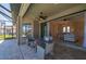Screened patio with a view of the interior living room and swimming pool at 2736 Magdalina Dr, Punta Gorda, FL 33950
