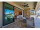 Inviting covered patio with comfortable seating, overlooking the beautiful pool and waterfront views at 2736 Magdalina Dr, Punta Gorda, FL 33950