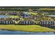 Aerial view of community with clubhouse, golf course and lake at 43050 Greenway Blvd # 614, Punta Gorda, FL 33982