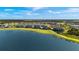 Aerial view of community highlighting lakefront and golf course at 43050 Greenway Blvd # 614, Punta Gorda, FL 33982