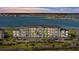 Luxury condo building with lake views and covered parking at 43050 Greenway Blvd # 614, Punta Gorda, FL 33982