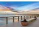 Tranquil waterfront deck with seating area at 43050 Greenway Blvd # 614, Punta Gorda, FL 33982