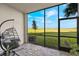 Relaxing lanai with tranquil water views and comfortable seating at 43050 Greenway Blvd # 614, Punta Gorda, FL 33982