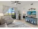 Relaxing living room with access to a balcony and lake view at 43050 Greenway Blvd # 614, Punta Gorda, FL 33982