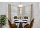 Breakfast nook with a round table and four chairs at 7116 Quigley St, Englewood, FL 34224