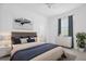 Spacious bedroom with king-size bed and ample closet space at 7116 Quigley St, Englewood, FL 34224