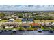 Aerial view of a canal-front home with a private dock and pool at 2736 Magdalina Dr, Punta Gorda, FL 33950