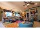 Large living room showcasing a stylish sectional sofa and guitar collection at 300 Madrid Blvd, Punta Gorda, FL 33950