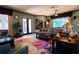 Spacious living room with comfortable seating and large windows at 300 Madrid Blvd, Punta Gorda, FL 33950