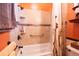 Updated bathroom with tub/shower combo and modern fixtures at 300 Madrid Blvd, Punta Gorda, FL 33950