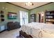 Bright bedroom with a large TV and plenty of storage at 300 Madrid Blvd, Punta Gorda, FL 33950