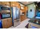 Modern kitchen with stainless steel appliances and breakfast bar at 300 Madrid Blvd, Punta Gorda, FL 33950