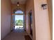 Bright entryway with double doors opening to a view at 300 Madrid Blvd, Punta Gorda, FL 33950