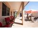 Relaxing patio with seating area and outdoor dining set at 300 Madrid Blvd, Punta Gorda, FL 33950
