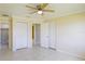 Bedroom with double door closet and access to bathroom at 21150 Gertrude Ave # A3, Port Charlotte, FL 33952