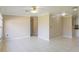 Open living area with tile floors and neutral color palette at 21150 Gertrude Ave # A3, Port Charlotte, FL 33952