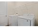 Well-equipped laundry room featuring modern washer and dryer units for convenient home care at 1293 Preston St, Port Charlotte, FL 33952