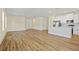 Expansive living area with luxury vinyl plank flooring and open layout to the kitchen and dining spaces at 1293 Preston St, Port Charlotte, FL 33952