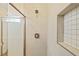 Clean shower with light tiled walls and built-in niche at 1293 Preston St, Port Charlotte, FL 33952