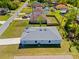 Aerial view of a single-Gathering home, showing the roof and backyard at 1301 Preston St, Port Charlotte, FL 33952