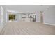 Open concept living and dining area featuring recessed lights and sliding doors at 1301 Preston St, Port Charlotte, FL 33952