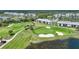 Aerial view of community with golf course and water features at 14271 Heritage Landing Blvd # 1526, Punta Gorda, FL 33955